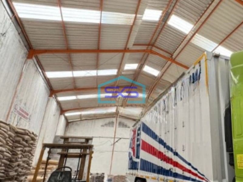 Dijual Gudang Luas Bangunan  986 m² Lokasi Bebas Banjir di Kapuk Kamal Jakarta Barat