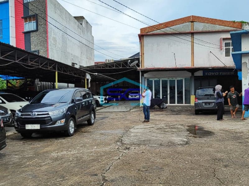 Disewakan Tanah + Bangunan Super Strategis di Jl. Demang Lebar Daun Palembang LT 1148m2