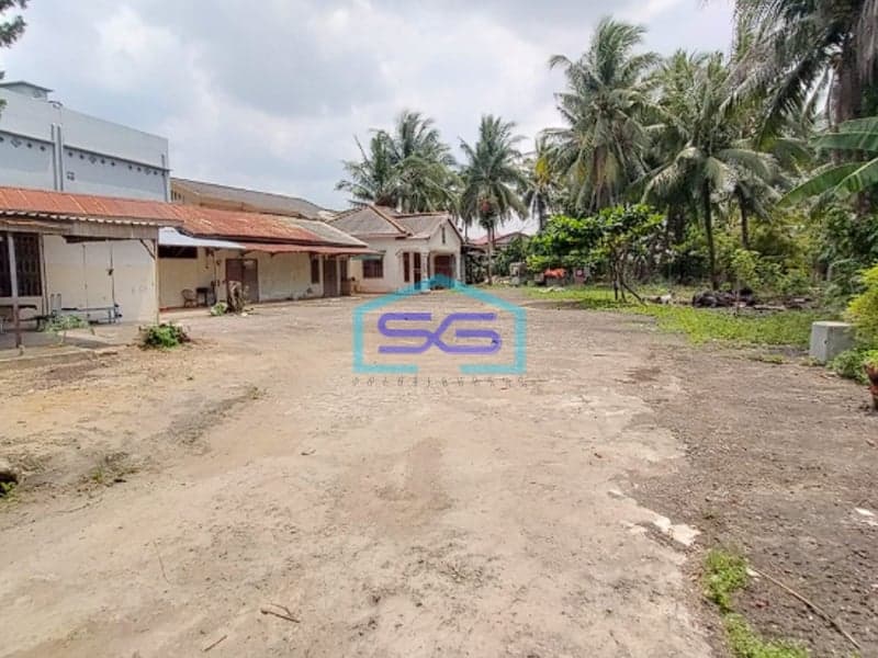Dijual Tanah Bonus Rumah di Pinggir Jalan Lokasi Strategis Jalan RE Martadinata Palembang LT 3300m2